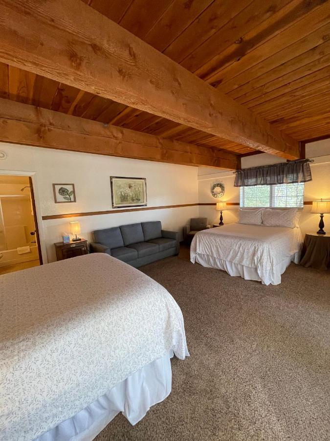 Deluxe Queen Room with Two Queen Beds and Private Bathroom